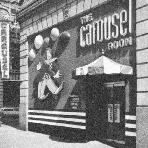A retro storefront with a mural of a dancing figure and bold &ldquo;The Canuse Room&rdquo; signage, a striped awning, and a small tented entrance.